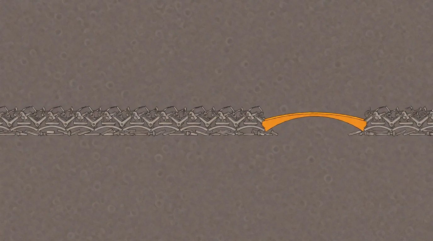 A vast gray assembly line of disconnected machinery interrupted by one simple, continuous amber bridge spanning the gap